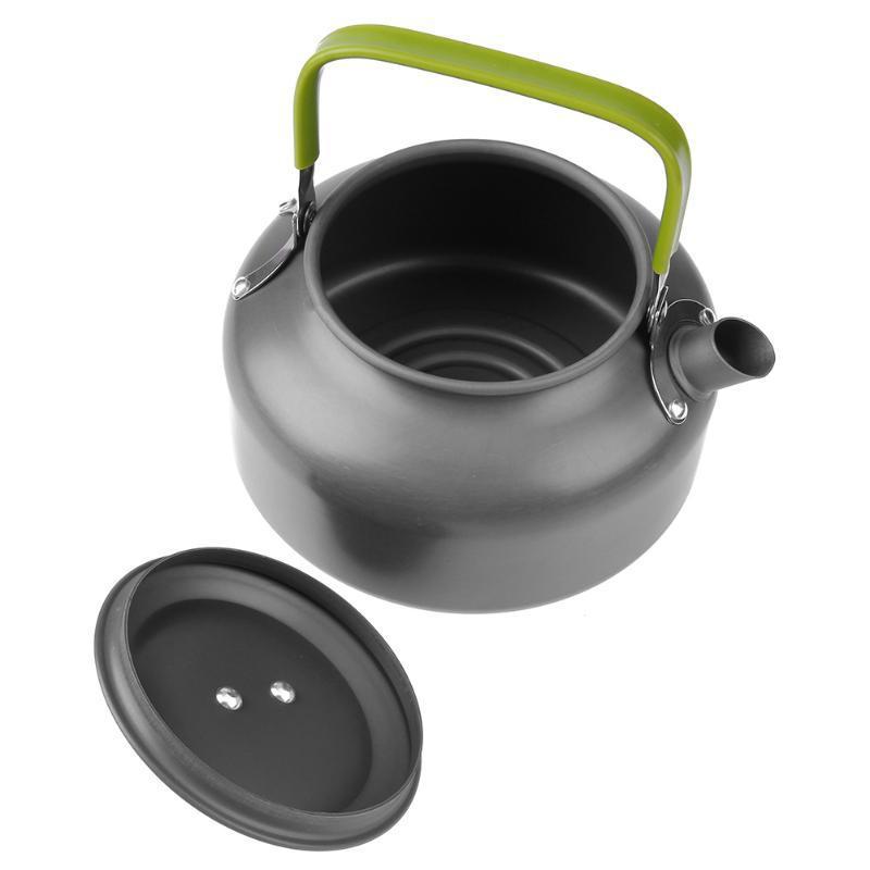 Gray kettle with a green handle on a white background