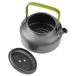 Gray kettle with a green handle on a white background