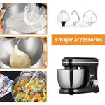 Black stand mixer with three major accessories used for different tasks.