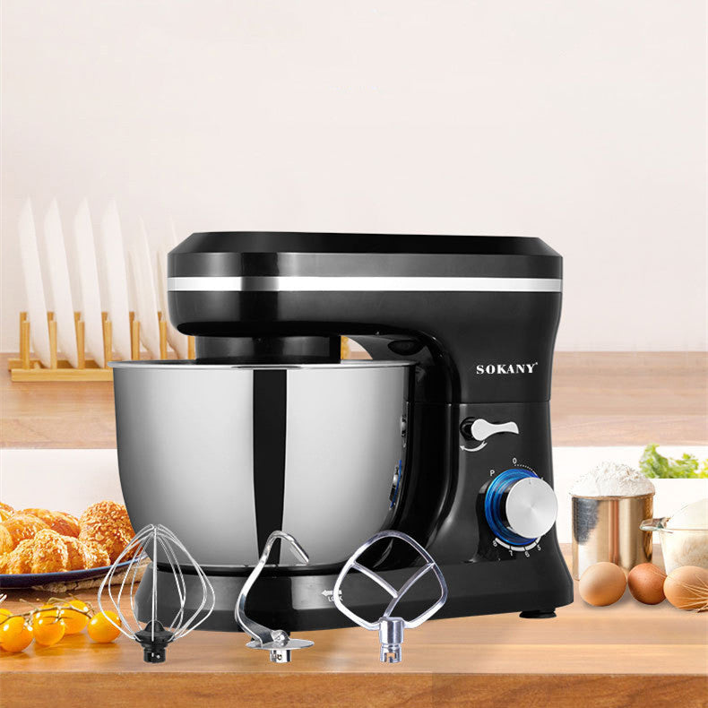 Black and silver stand mixer with attachments on a kitchen counter