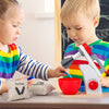 Kids Wooden Kitchen Toy Set with Cooking Pots and Appliances”.Two children playing with a toy kitchen set in a classroom setting.