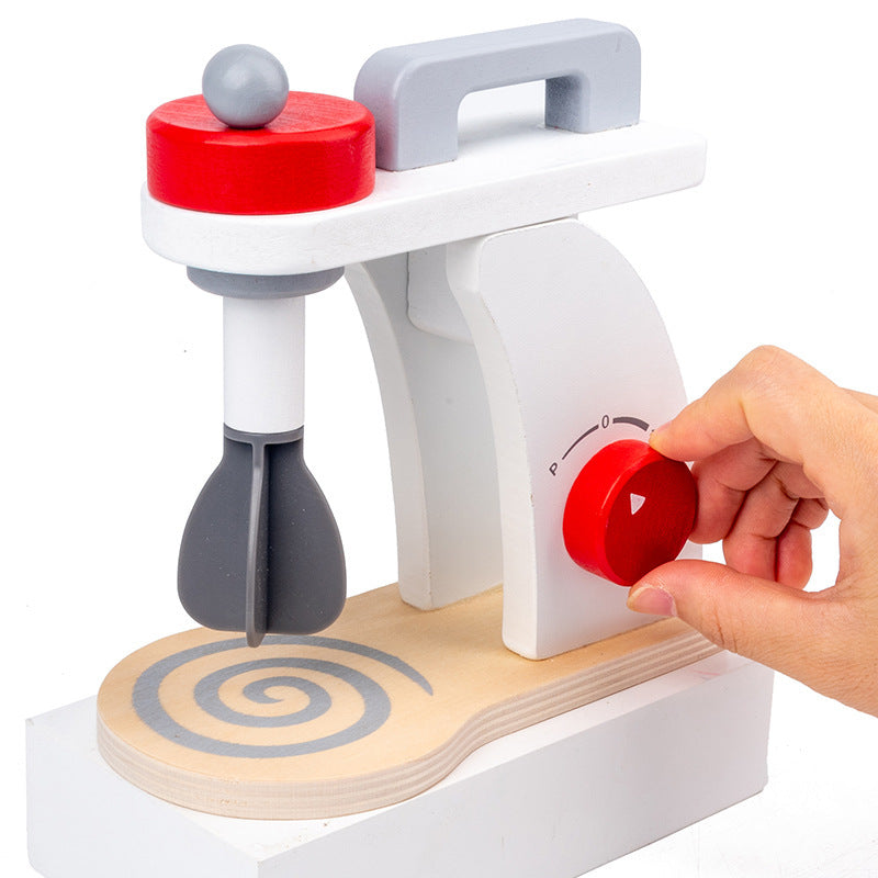 Wooden toy with red and gray components, being adjusted by a hand on a white background